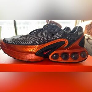 Nike Air Max Dn QS sneaker in the Dark Smoke Grey and Salsa Red